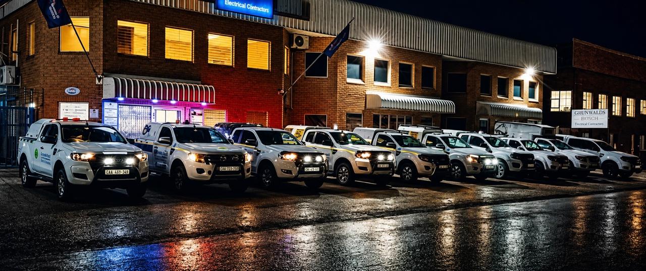 Grunwalds field service fleet outside the workshop at night